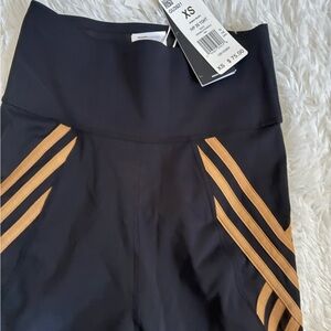 Ivy Park x Adidas Black and Gold Leggings